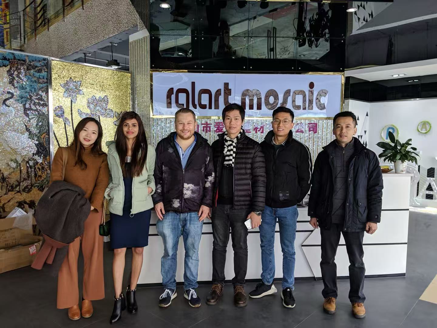 Cecilia Zhang and a buyer's team at a stone and mosaic factory, 2019